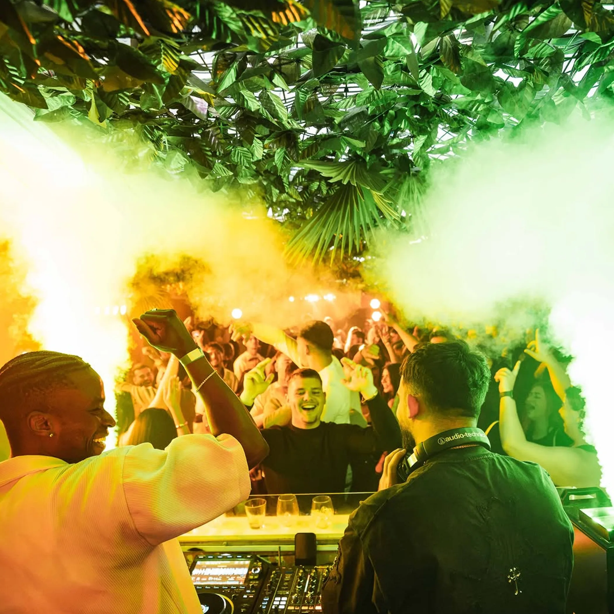 dj performing at lively nightlife event