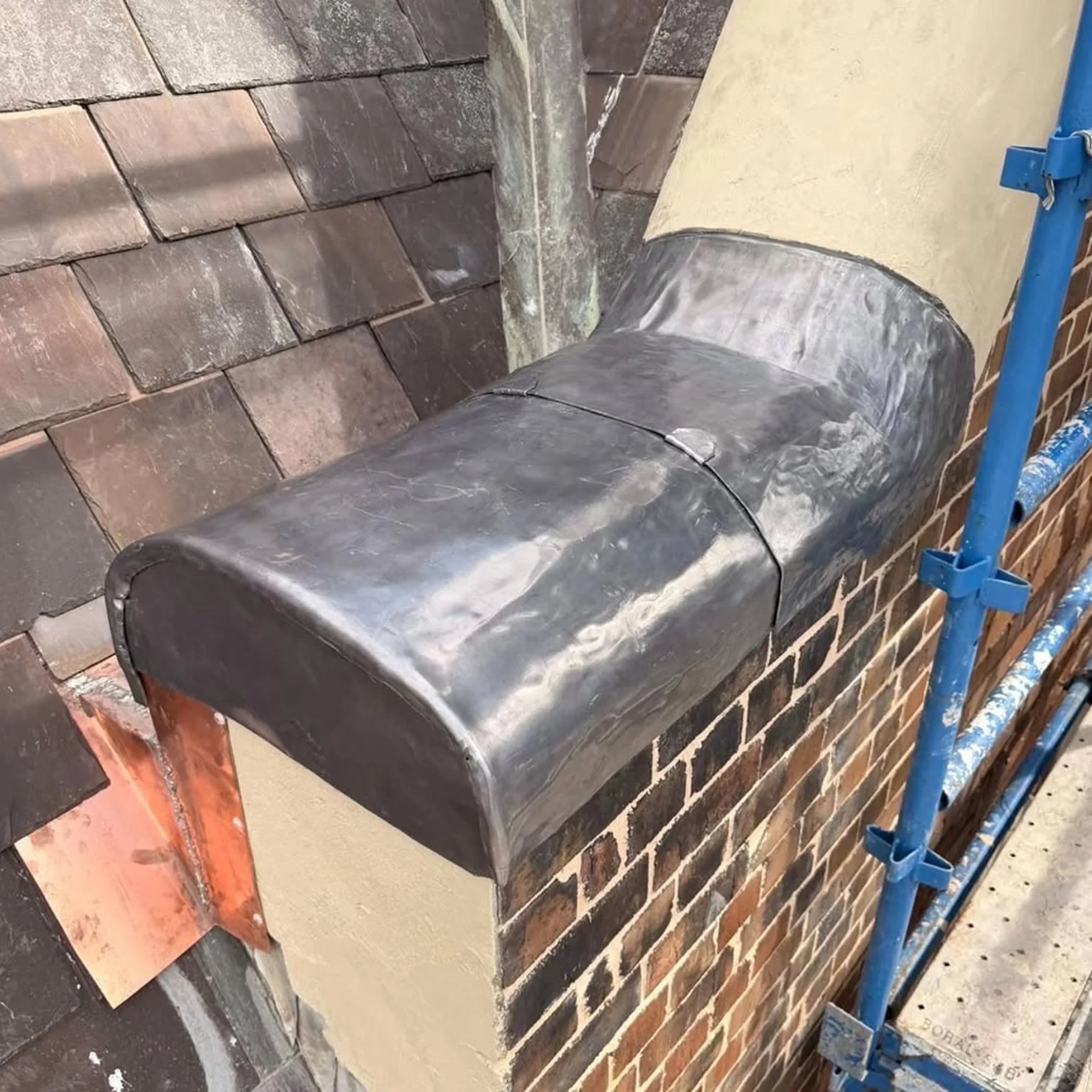 repaired parapet box gutter